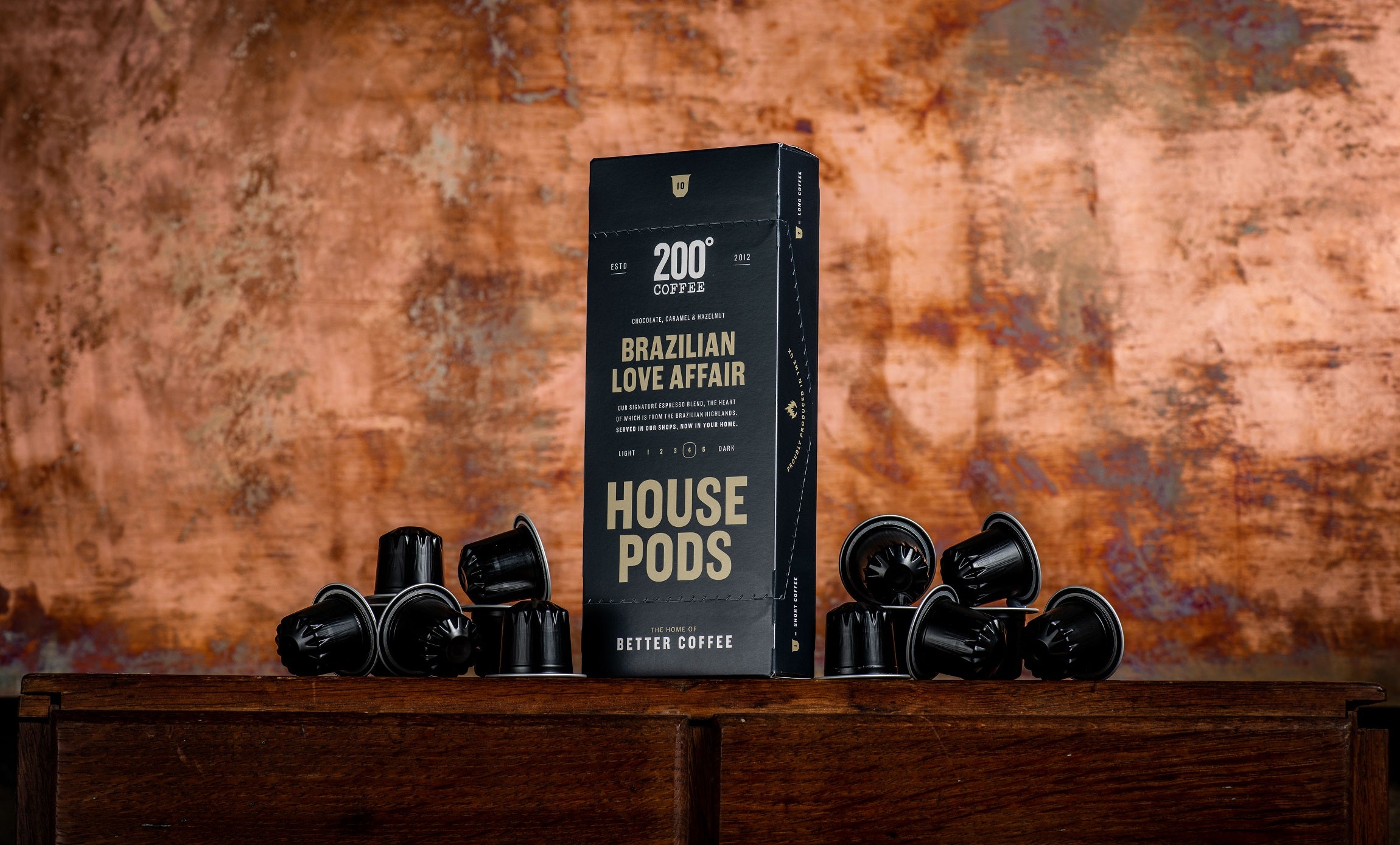 200 degrees coffee pods box with assortment of coffee pods around it