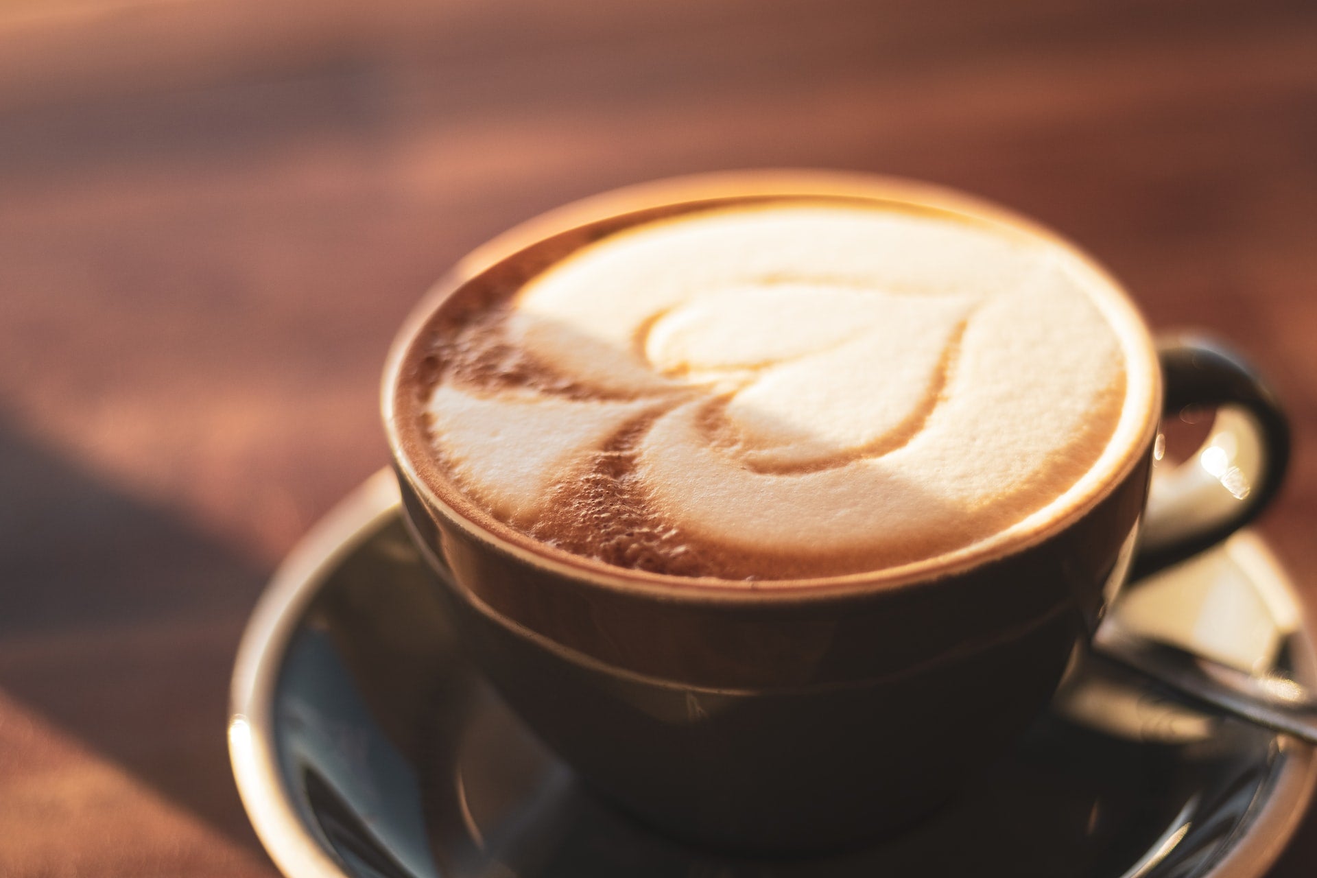 frothy coffee with love heart latte art